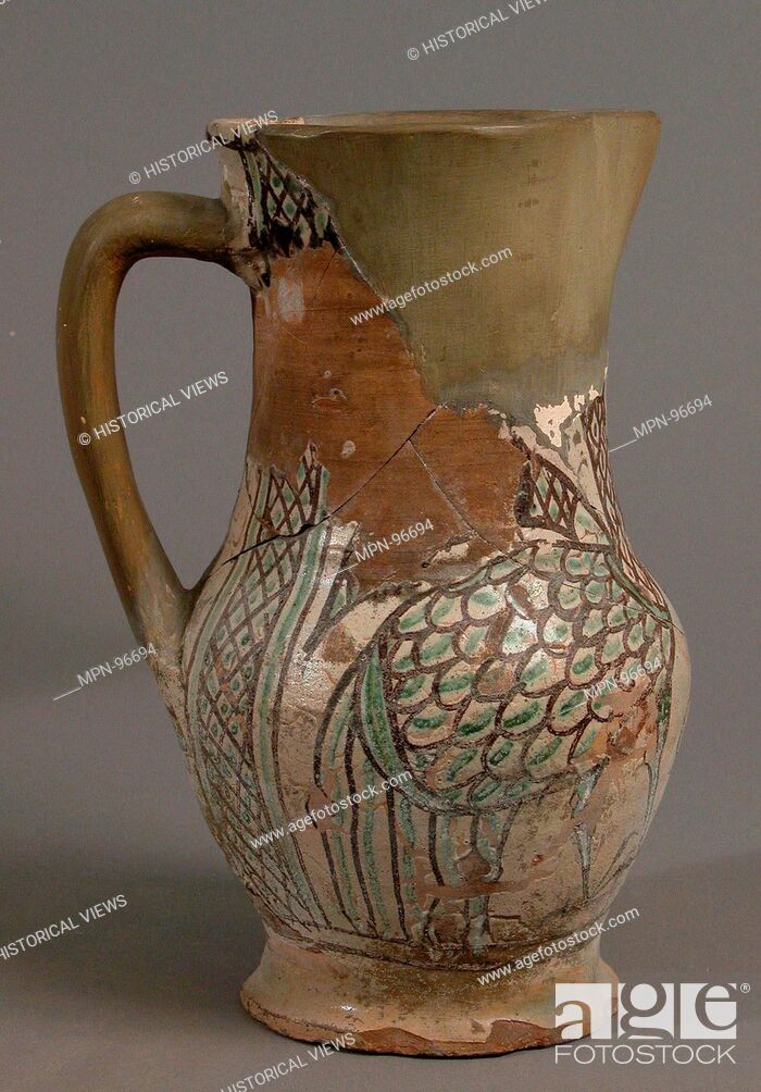 Stock Photo: Pitcher. Date: early 15th century; Geography: Made in Orvieto, Italy; Culture: Italian; Medium: Earthenware, tin-glaze (Majolica); Dimensions: Overall: 8 1/8 x.