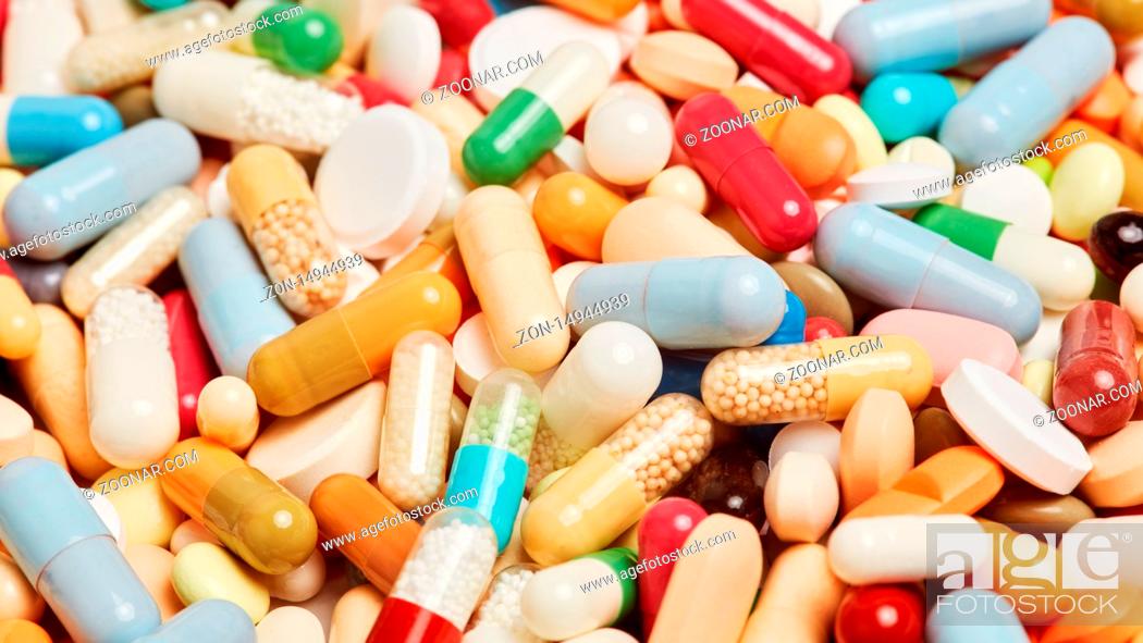 Stock Photo: Gesundheit Konzept mit vielen bunten Medikamenten.