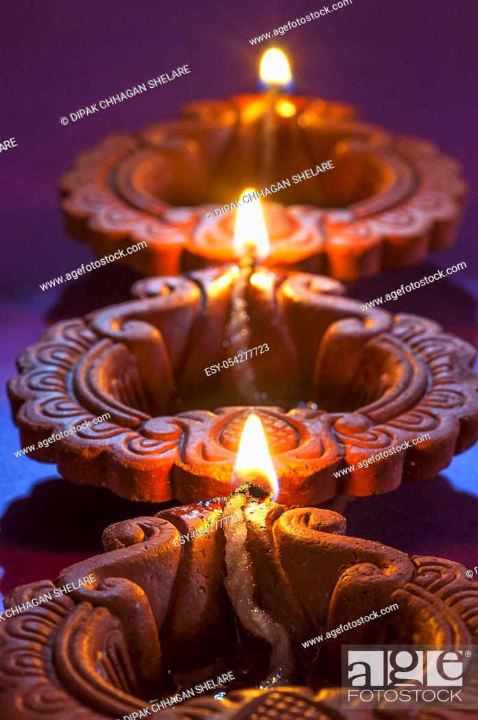 Clay diya lamps lit during Diwali Celebration. Greetings Card Design Indian  Hindu Light Festival..., Stock Photo, Picture And Low Budget Royalty Free  Image. Pic. ESY-054277723 | agefotostock