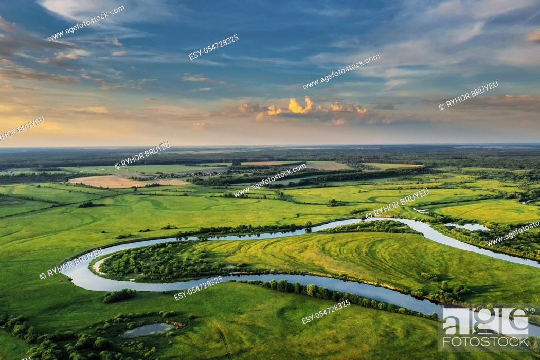 Stock Photo: Aerial View Of Green Forest, Meadow And River Landscape In Sunny Evening. Top View Of European Nature From High Attitude In Summer Sunrise.