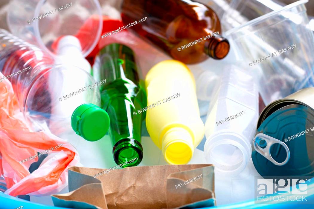 Stock Photo: Eco concept with Recyclable garbage consisting of glass, plastic, metal and paper.