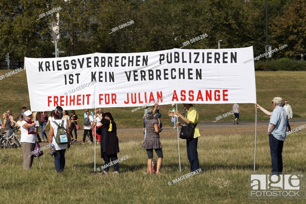 Stock Photo: Demo against corona rules on the Rhine meadows, Transparent freedom for Julian Assange, Düsseldorf, North Rhine-Westphalia, Germany, Europe.