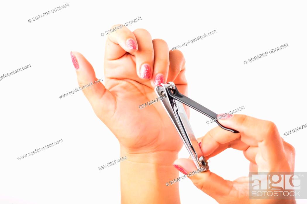 Close up young Asian woman have tool cutting nails fingernails on finger  using a nail clipper, Stock Photo, Picture And Low Budget Royalty Free  Image. Pic. ESY-056473594 | agefotostock