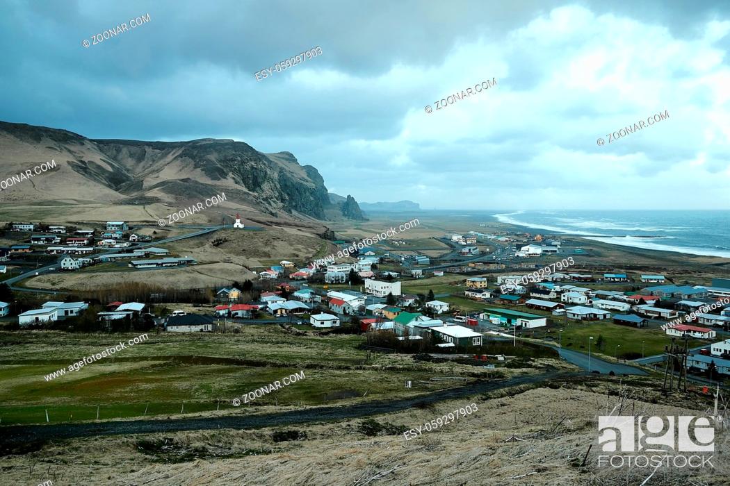 Stock Photo: Town of Vik in Iceland getting dark after sunset.