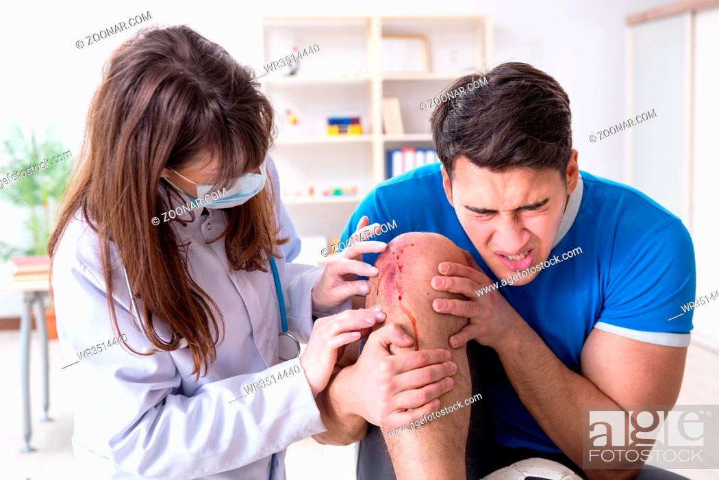 Photo de stock: Patient visiting doctor after sustaining sports injury.