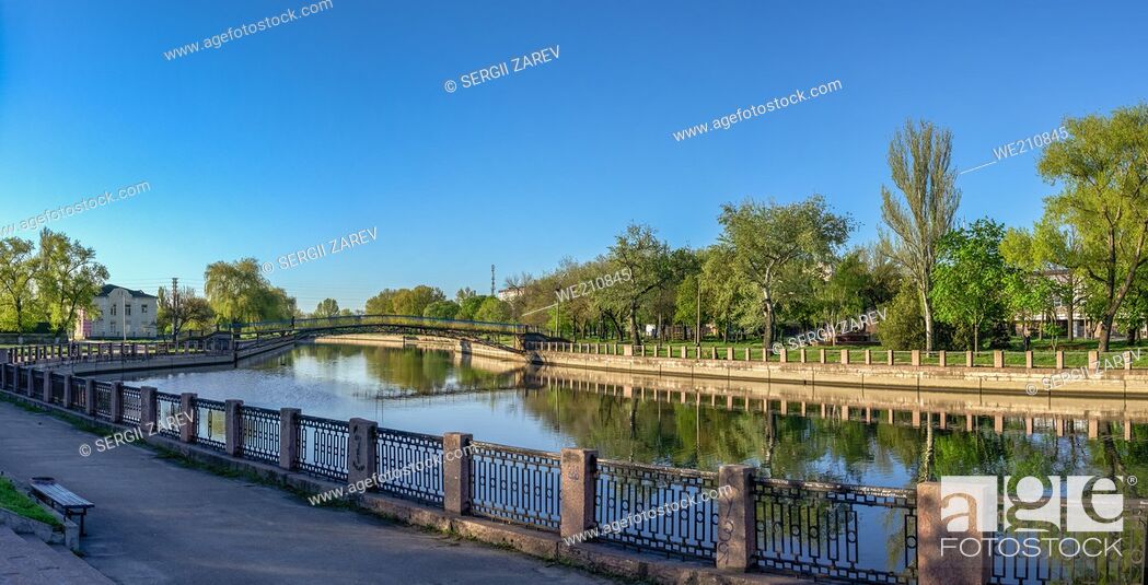 Stock Photo: Ingul river embankment in Kropyvnytskyi, Ukraine, on a sunny spring morning.