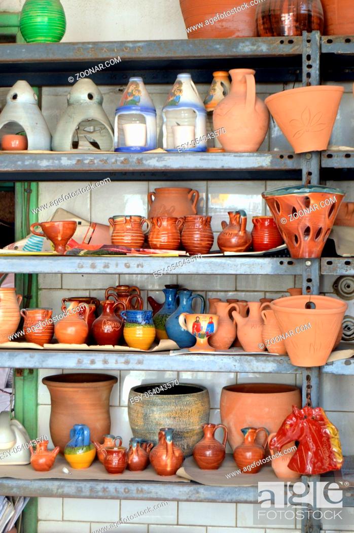 Photo de stock: Shelf of potteries of all kind in a business.