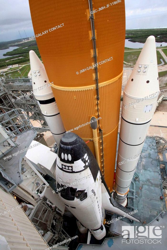 Stock Photo: Space shuttle Atlantis is revealed on Launch Pad 39A at NASA's Kennedy Space Center in Florida following the move of the rotating service structure (RSS).
