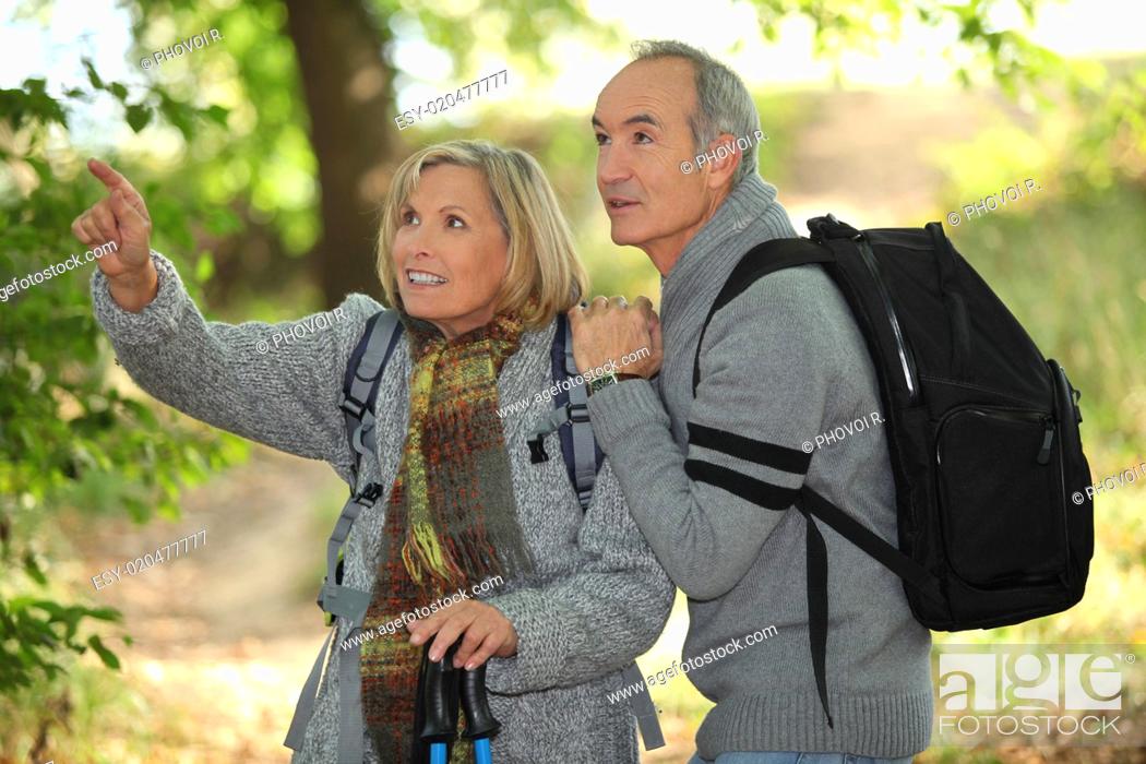 Stock Photo: older couple in woods.