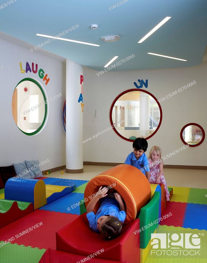 Stock Photo: Interior view with kids playing. Victory Heights Primary school, Dubai, United Arab Emirates. Architect: R+D Studio , 2016.