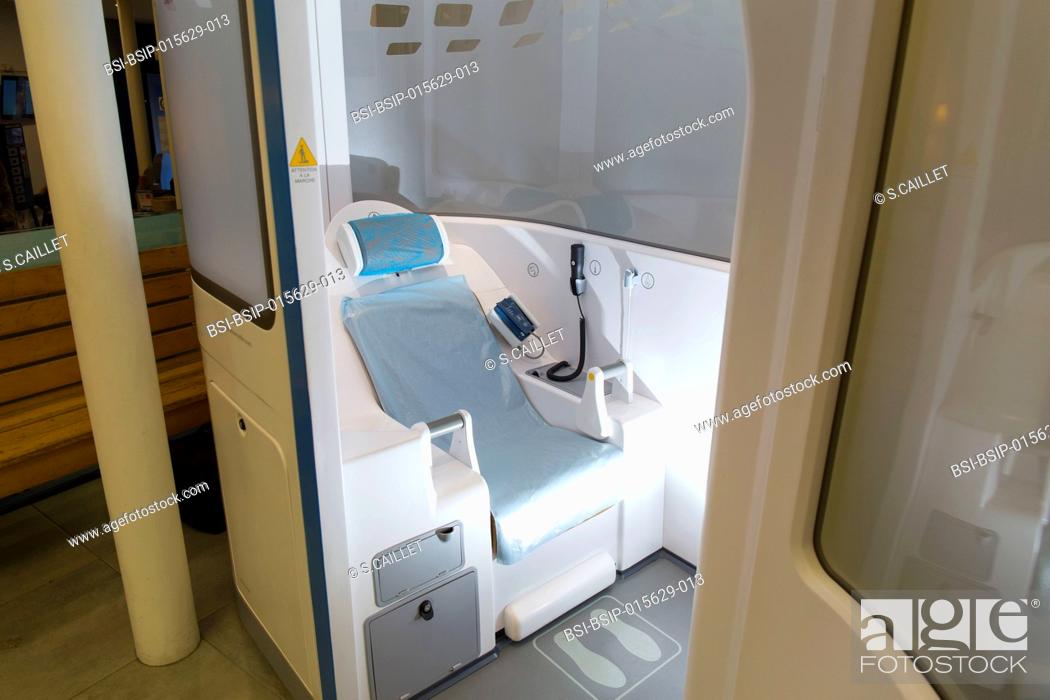 Stock Photo: E-health monitoring booth made available for students with student health cover in Paris, France. Students can have a remote check-up, guided by adapted videos.