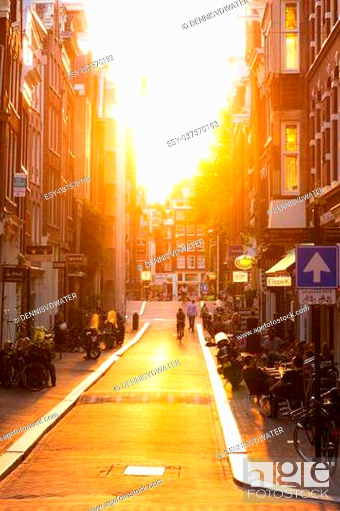 Stock Photo: Summer sunset in the nine little streets in Amsterdam, the Netherlands.