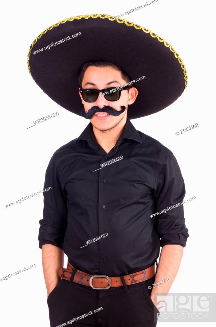 Stock Photo: Funny man wearing mexican sombrero hat isolated on white.