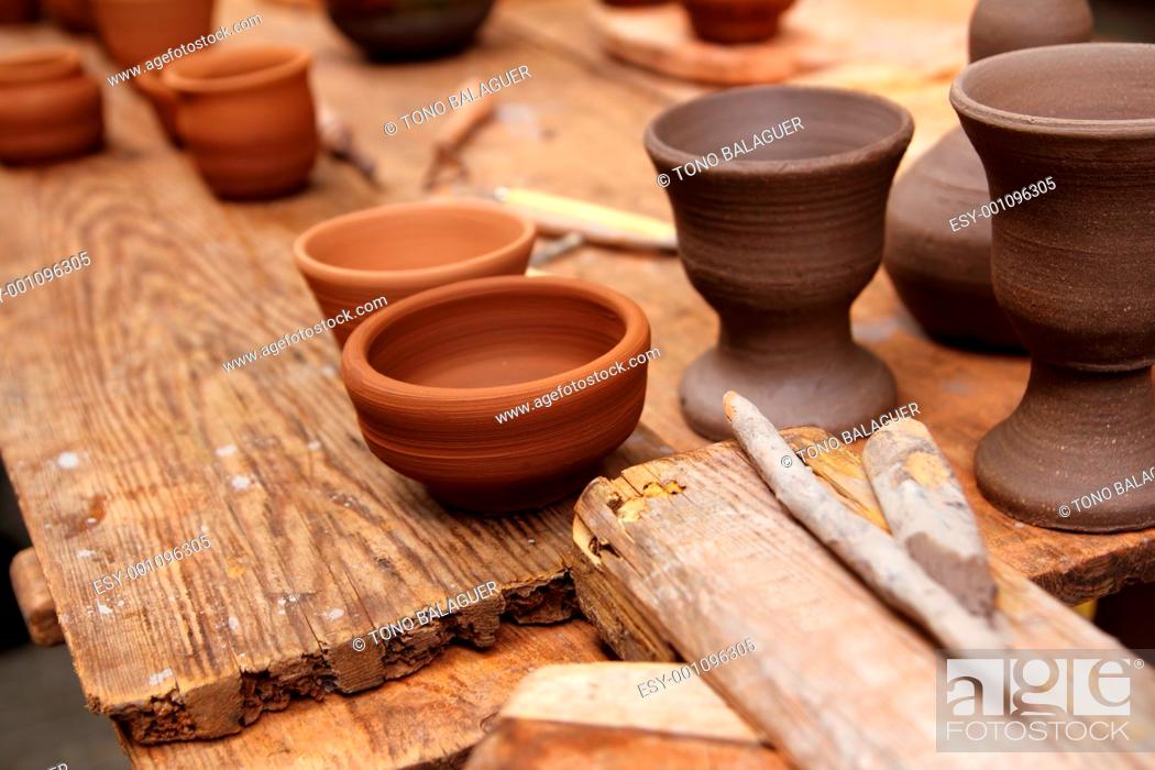 Stock Photo: clay pottery potter ceramics handcrafts on vintage table artisan studio.