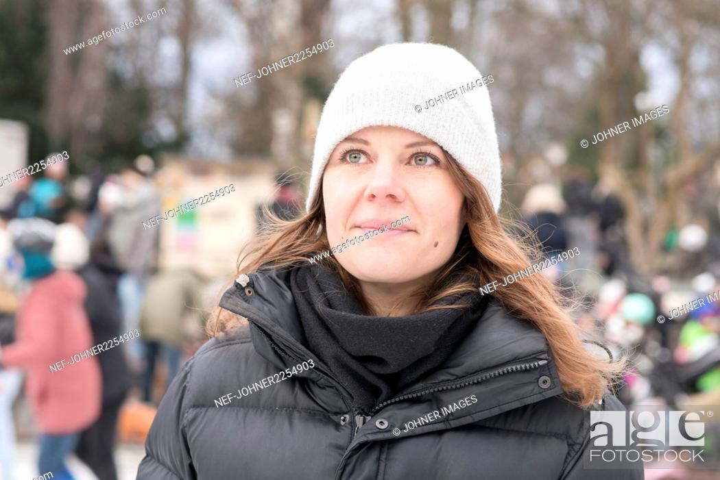 Stock Photo: Smiling woman on ice rink.