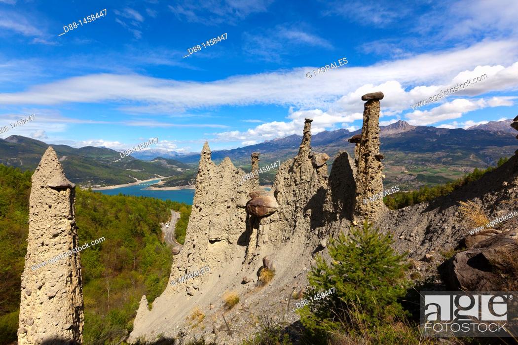 Stock Photo: France, Hautes Alpes, Fairy Chimneys of Pontis above Serre Poncon lake.