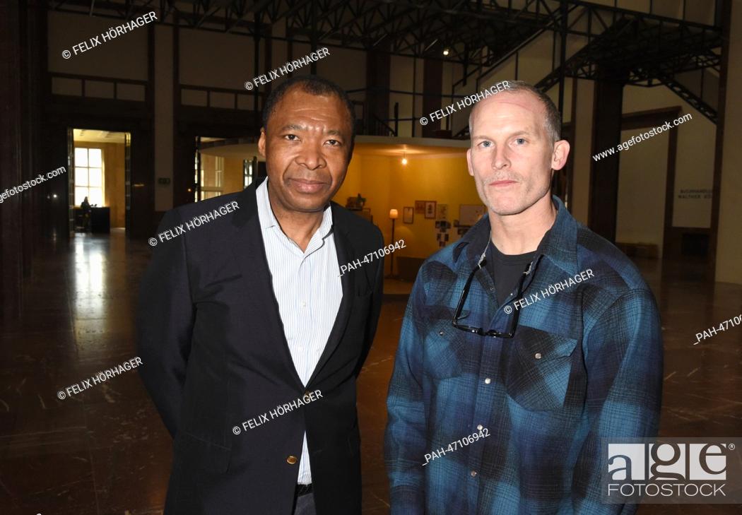 Stock Photo: US American artist Matthew Barney (R) and director of Haus der Kunst Munich Okwui Enwezor stand during a press conference about his exhibition ""Matthew Barney:.