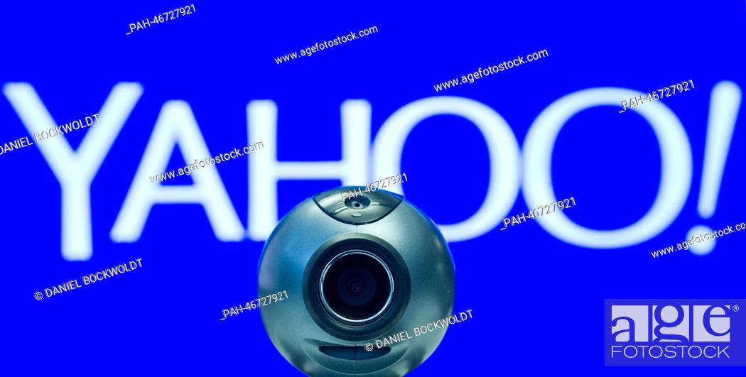 Stock Photo: ILLUSTRATION - An illustration shows a webcam in front of the logo of Yahoo in Berlin,  Germany, 28 February 2014. Accodring to a report in the ""Guardian"".