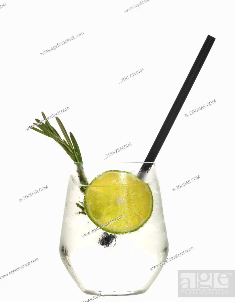 Stock Photo: Glass with alcoholic drink with lime and ice isolated on white background.