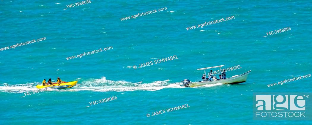 Stock Photo: banana boat ride off Isla Verde Beach on the Atlantic Ocean in the Metropolitan Area of San Juan in Carolina Puerto Rico.