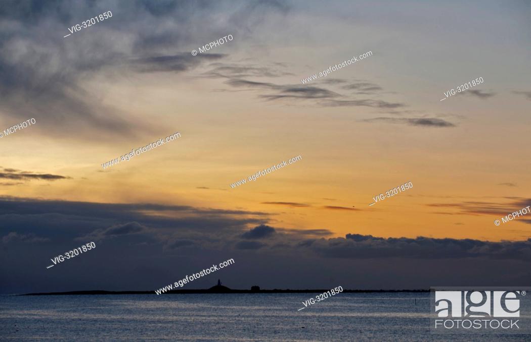 Stock Photo: The islet of Rauna at dawn at Östhassel, Lista, south-western Norway in December. - 01/01/2012.