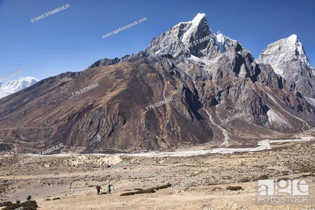 Stock Photo: Trekking to Everest Base Camp under Cholatse and Taboche peaks, Khumbu, Nepal.
