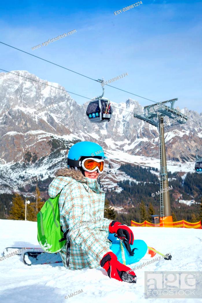 Stock Photo: Ski, skier, winter - lovely girl has a fun on ski. Vertical view.