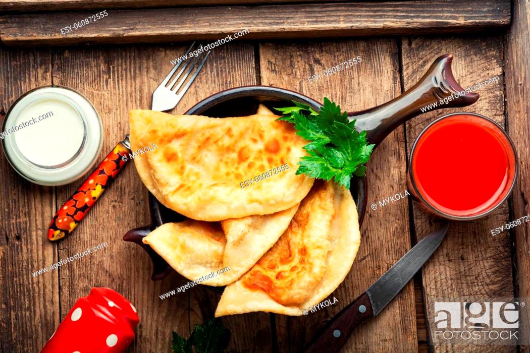 Stock Photo: Cheburek, popular and traditional dish of Greek and Tatar cuisine. Fried pies.