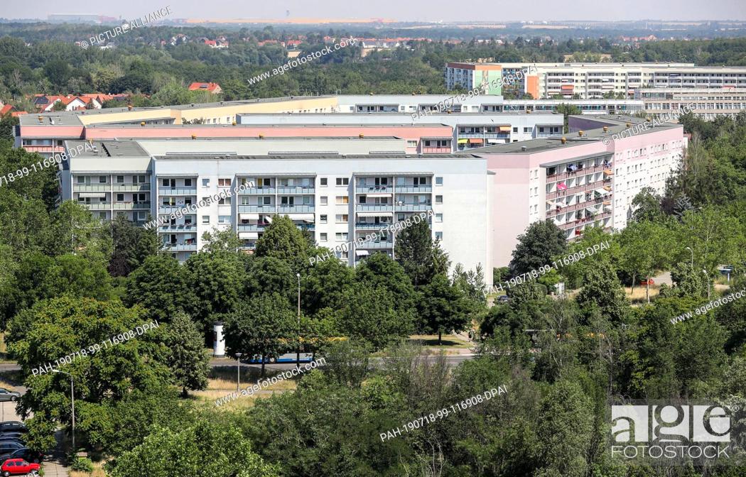 Stock Photo: 26 June 2019, Saxony, Leipzig: View of GDR prefabricated buildings in the Leipzig-Grünau district. After decades of moving away and demolishing empty.