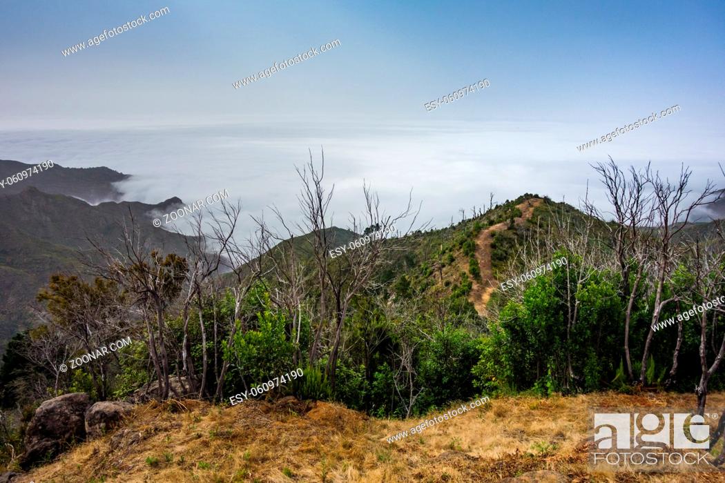 Stock Photo: Views on a hiking trail near Erjos on Tenerife island above the clouds.