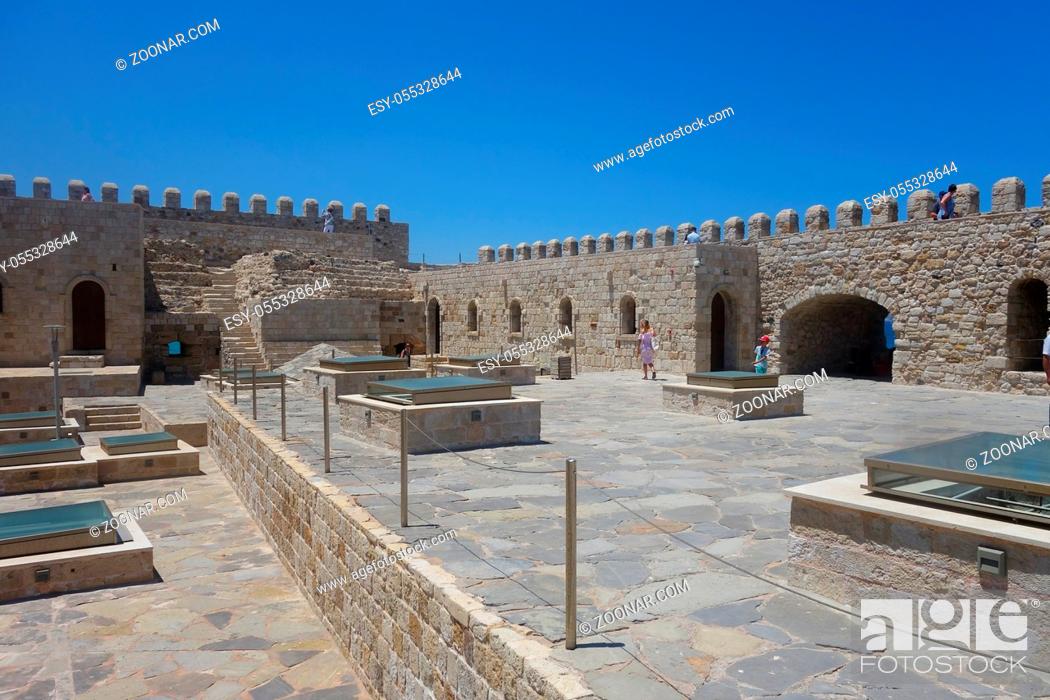 Stock Photo: Hot summer day and a walk in the area of the old port and the city fortress.