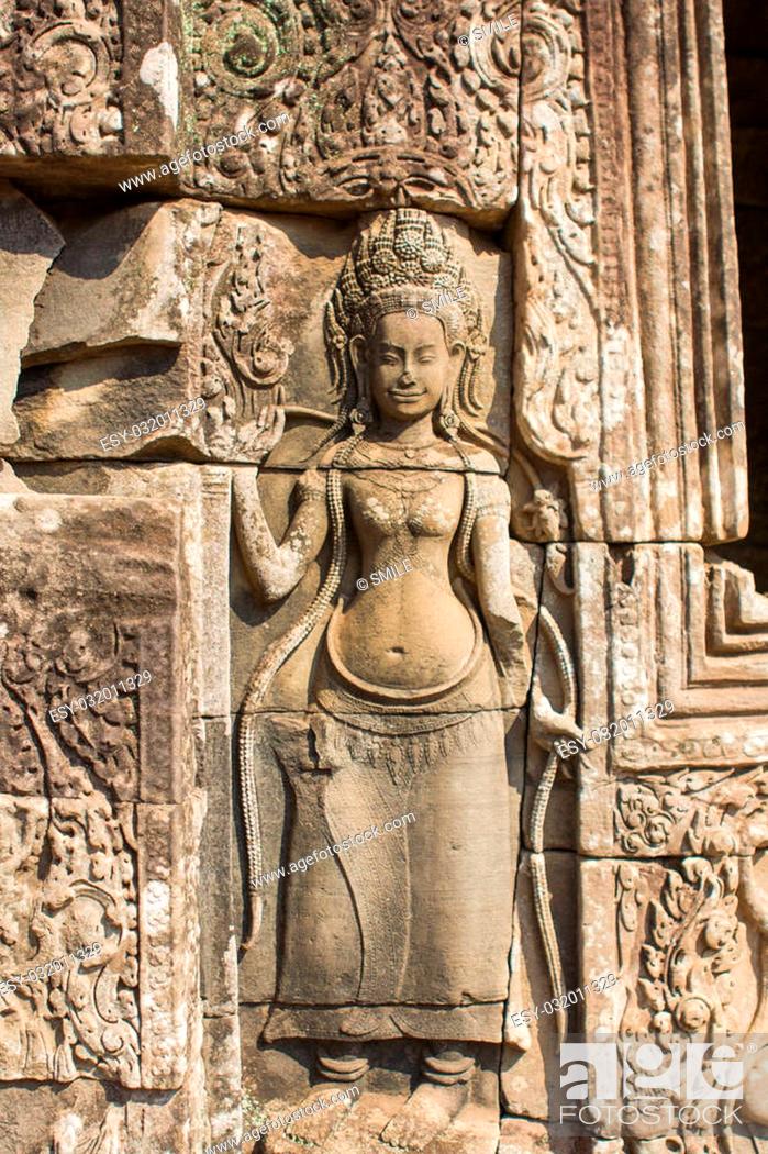 Stock Photo: Apsara dancer stone carving at Angkor Wat temple, Siem Reap, Cambodia.
