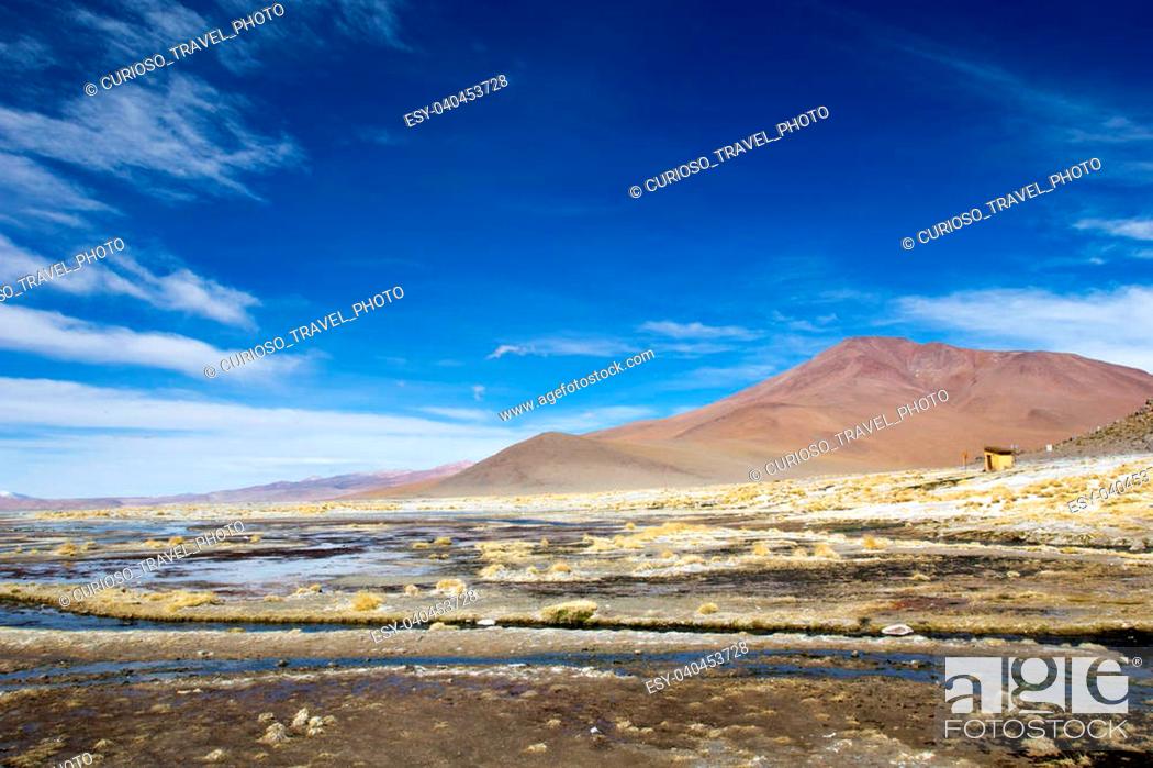 Stock Photo: Desert and mountain over blue sky and white clouds on Altiplano, Bolivia.