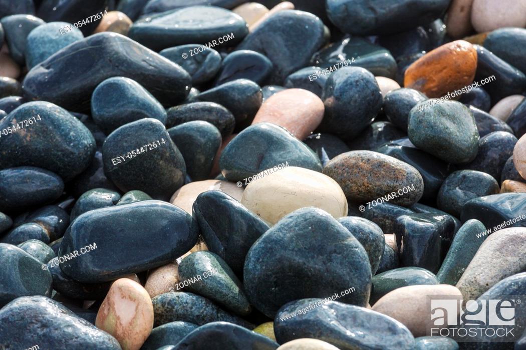 Stock Photo: pebble on the sunrise beach.