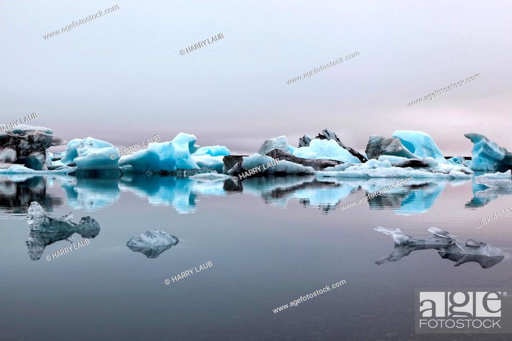 Stock Photo: Ice, icebergs with traces of volcanic ash, glacier, glacial lagoon of the Vatnajökull glacier, Jökulsarlon, Iceland.