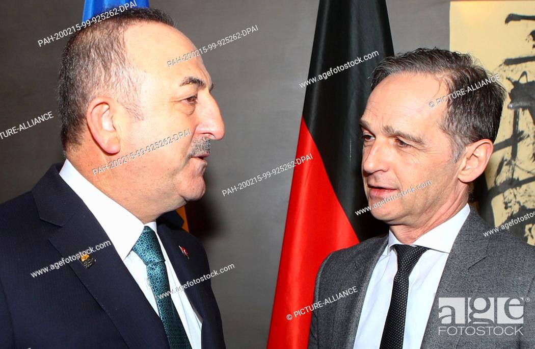Stock Photo: 15 February 2020, Munich: The Turkish Foreign Minister Mevlut Cavusoglu (l) and his German counterpart Heiko Maas talk on the second day of the 56th Munich.