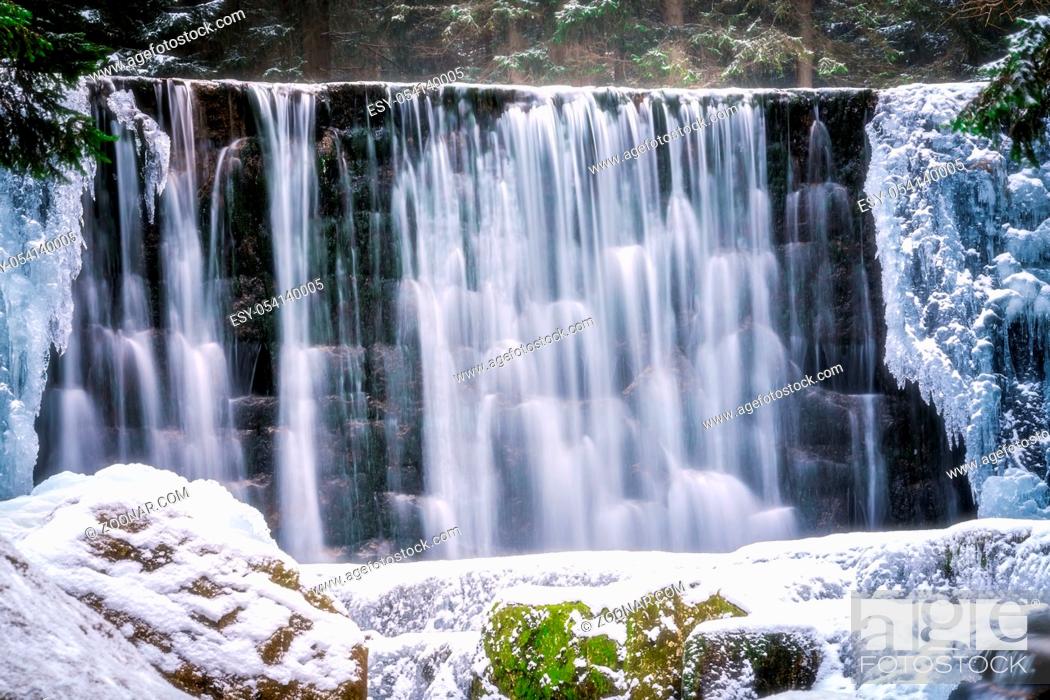 Stock Photo: Wild Waterfall, known as Dziki Wodospad, in beautiful scenery of Karkonosze Mountains in Karpacz, Poland, photographed in winter.