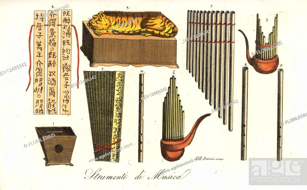 Chinese musical instruments: zhu 1, yu in the of a tiger 2, paiban free-reed bamboo sheng 5, Foto de Stock, Imagen Derechos Protegidos Pic. MEV-12486342 | agefotostock