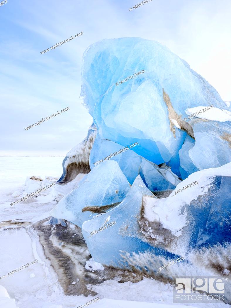 Stock Photo: Iceberg in the frozen Mohnbukta in Sabine-Land. The island Spitzbergen in the Svalbard archipelago. Arktic, Europe, Scandinavia, Norway, Svalbard.