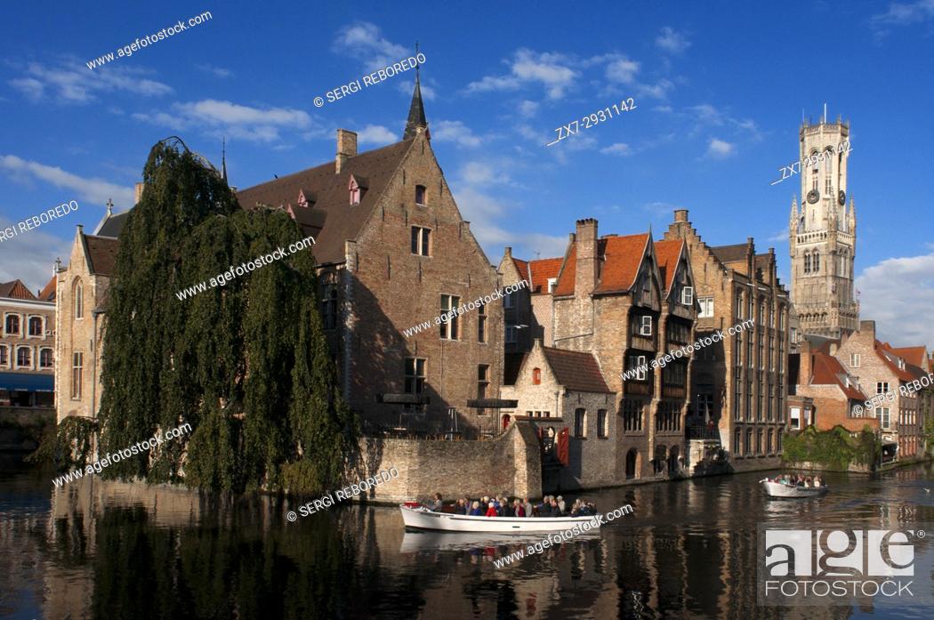 Stock Photo: The Belfry of Bruges, Belfort (Medieval Bell Tower), Rozenhoedkaai, Bridge over Dijver Canal. Belfry Tower And Dijver Canal.