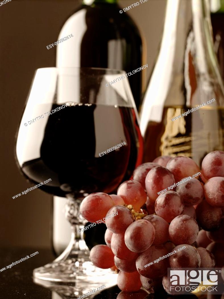 Imagen: Old wine  Still life with wine bottles and goblet.