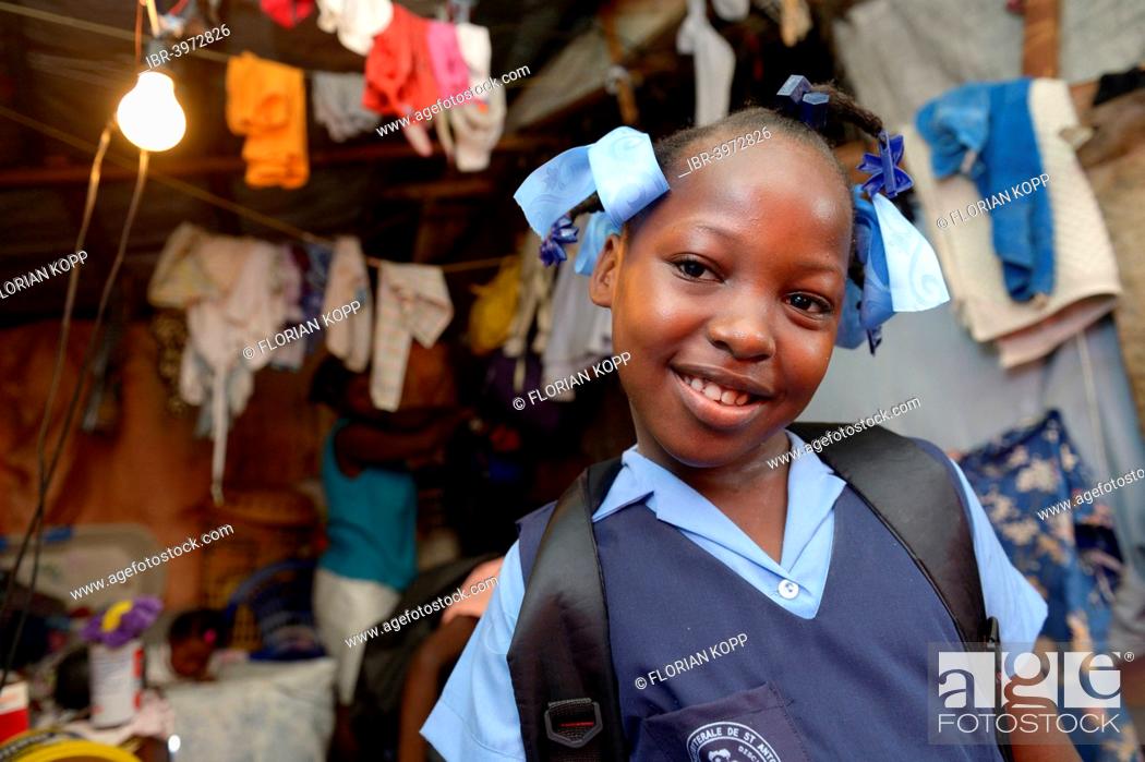 Stock Photo: Girl, 9 years, in school uniform, Camp Icare for earthquake refugees, Fort National, Port-au-Prince, Haiti.