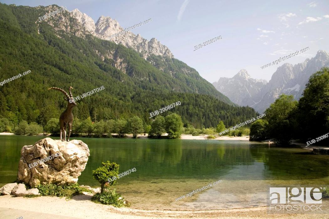 Stock Photo: The famous Ibex statue at Lake Jasna just a ten minute walk form the centre of the town at the entrance to Velika Pisnica near the road to Vrsic Mountain Pass.