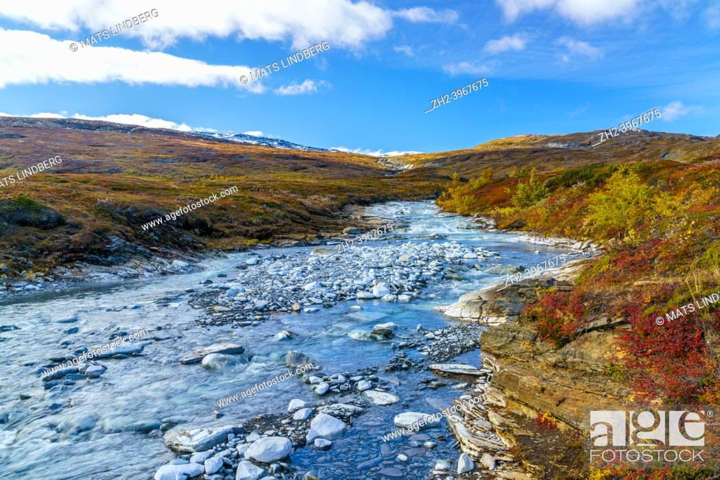 Stock Photo: Rakkasjohka in autumn season with beautifull colors and clear water, Björkliden, Swedish Lapland, Sweden.