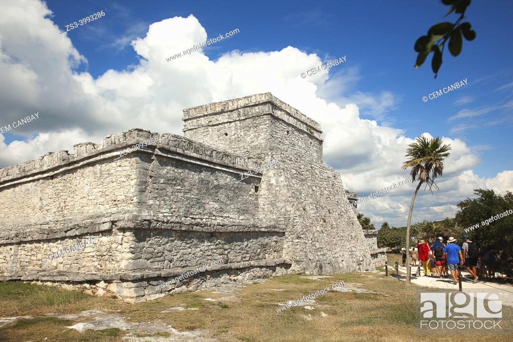 Stock Photo: Visitors in front of the The Castle at the Prehispanic Mayan city of Tulum Archaeological Site, Tulum, Quintana Roo, Mexico, Central America.