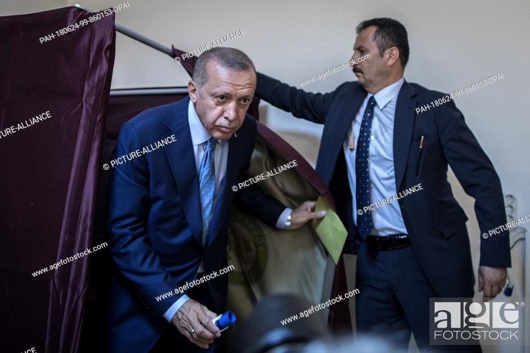 Stock Photo: Turkish President Tayyip Recep Erdogan leaves the voting booth to vote in Turkey's elections at a polling station, in Istanbul, Turkey, 24 June 2018.