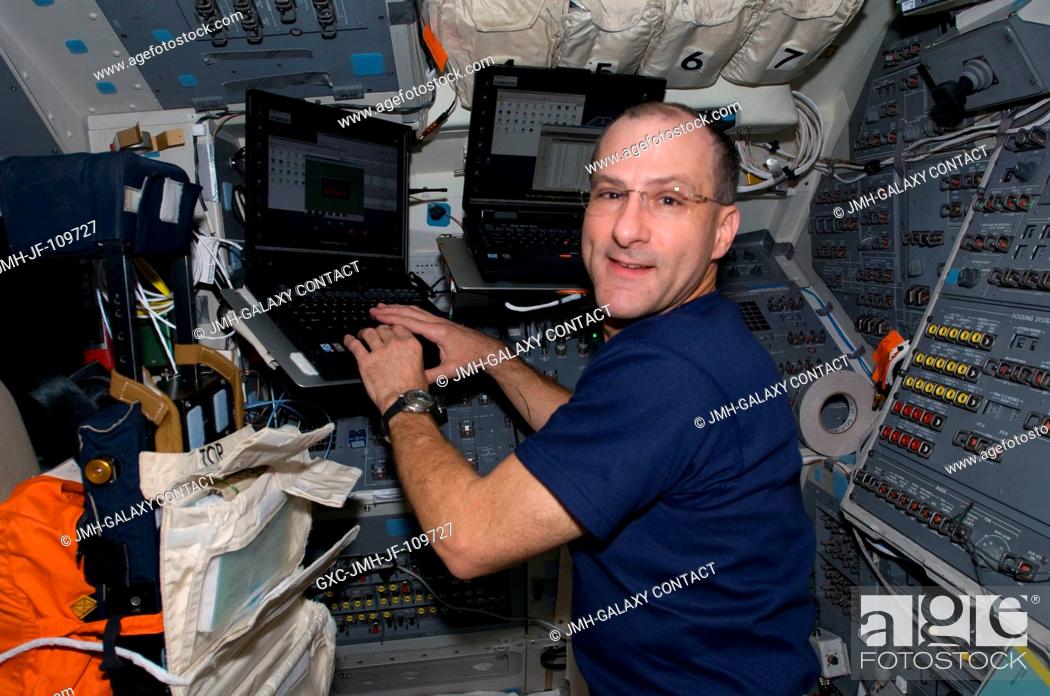 Stock Photo: On Endeavour's aft flight deck, astronaut Don Pettit, STS-126 mission specialist, is one of seven astronauts onboard the space shuttle who are anticipating.