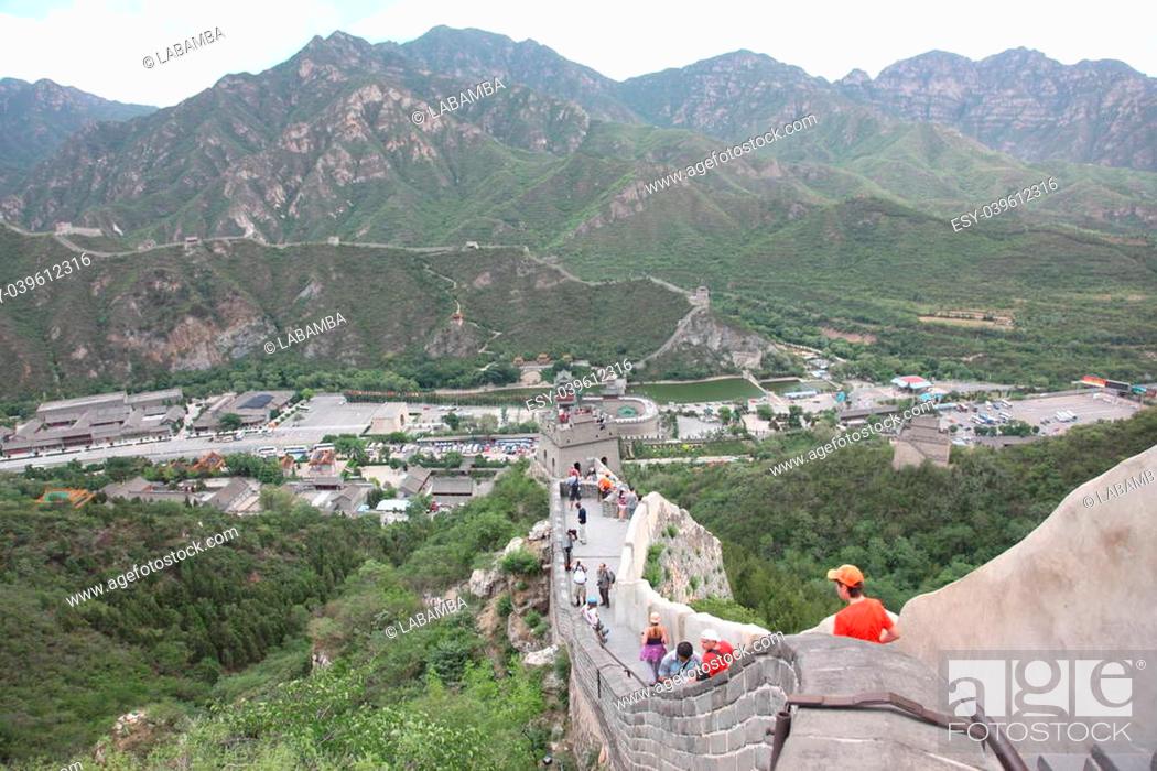 Stock Photo: BEIJING - JUNE 12: Visitors walks on the Great Wall of China on June 12 2012. Four million people visits the great wall each year.