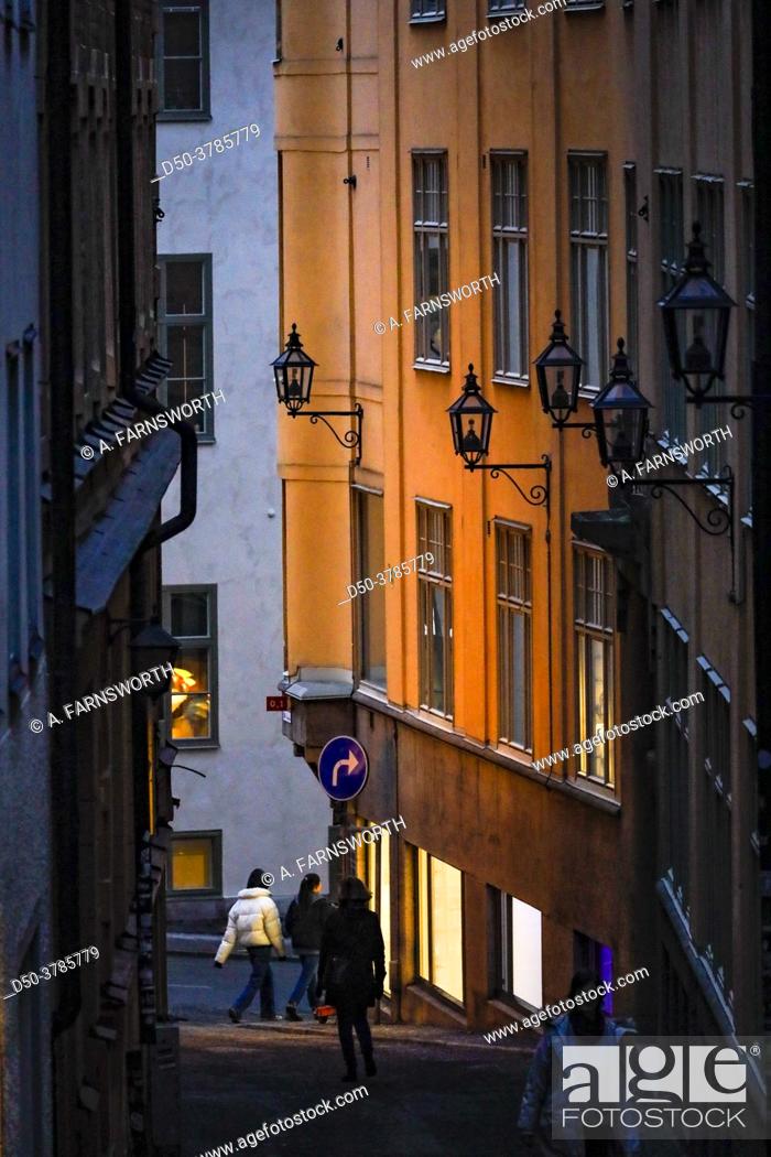 Stock Photo: Stockholm, Sweden Pedestrians on a narrow street called Klevgrand on Sodermalm.