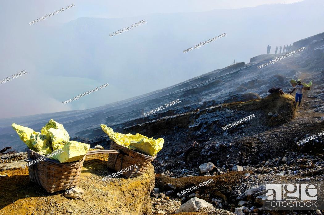 Stock Photo: Indonesia, Java, East Java, Pieces of sulphur on the rim of the Ijen crater lake.